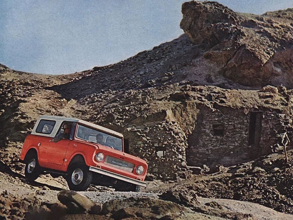 Red International Scout on a desert trail